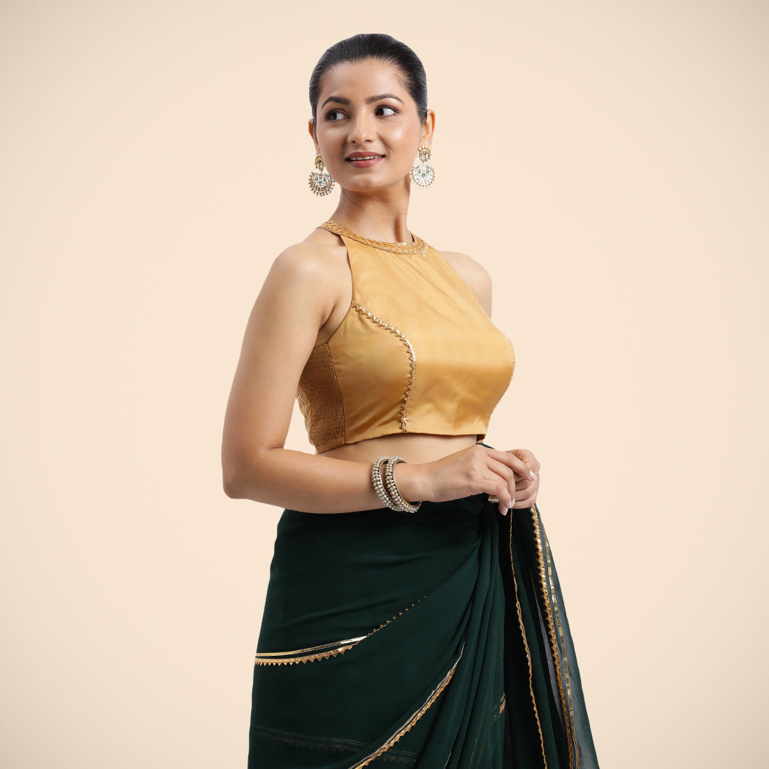Zubeida x Tyohaar Saree Blouse, in Gold Vegan Silk, featuring sleeveless and halter neckline, made for party & festive (view 3).