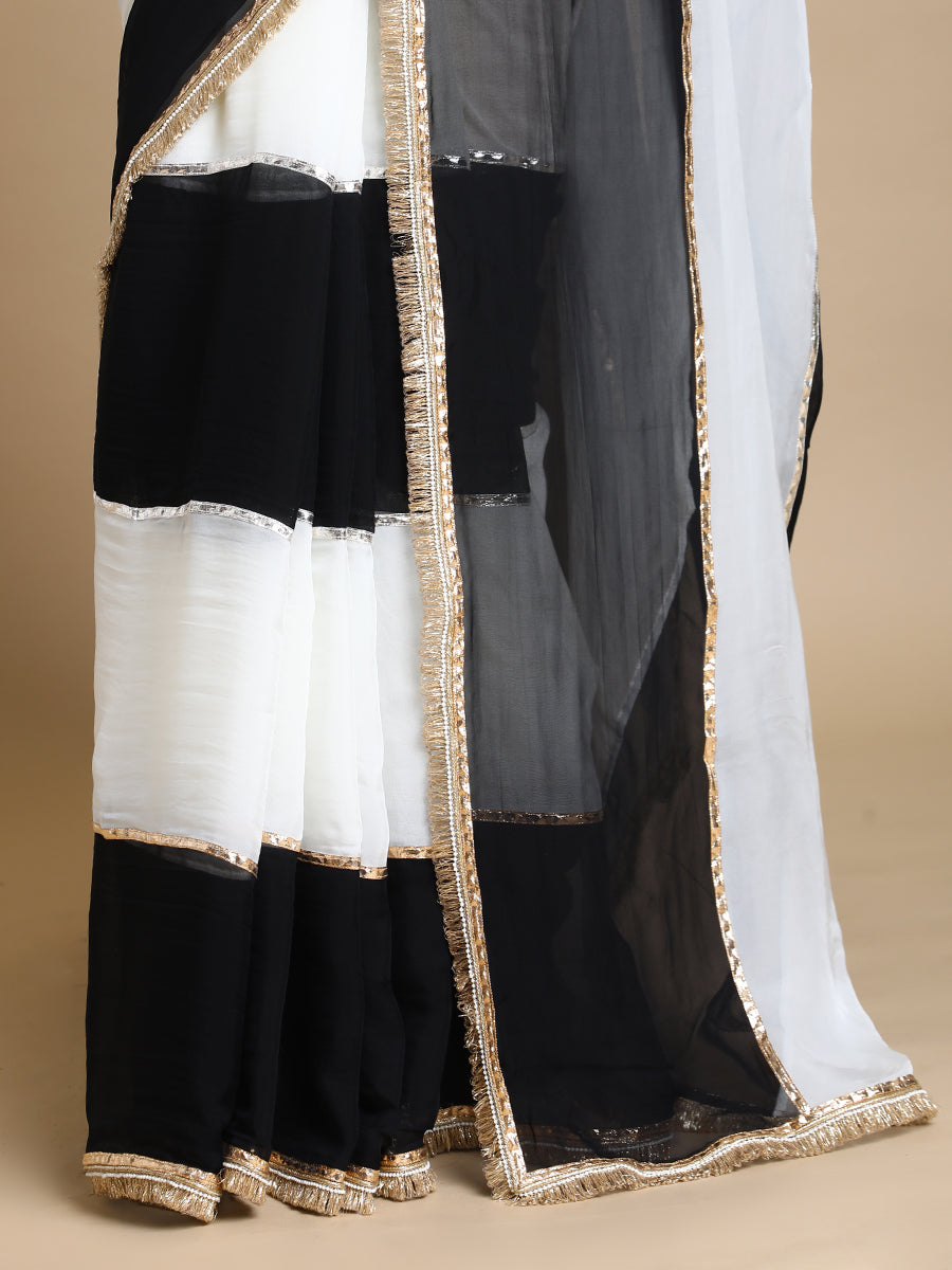 Kajol x Tyohaar Saree, in Black Viscose Organza, made for party & festive (view 2).