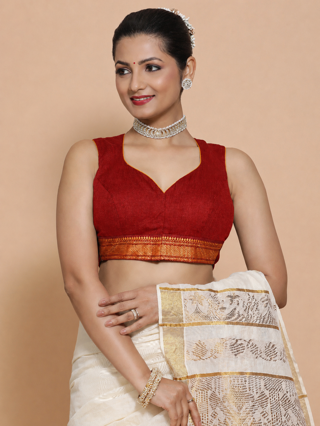 Kasavu-Kit Kasavu Saree with Varsha Sleeveless blouse in Chilli Red Mangalgiri