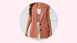a woman in a pink blazer