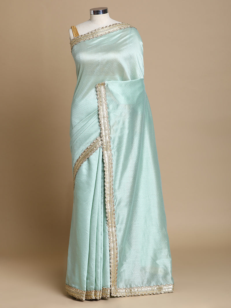 Anwesha x Tyohaar | Light Green Foil Chandheri Saree With Designer Embroidered Lace