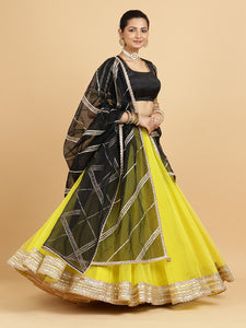 Farah Aziza 4-Pc Lehenga Set x Tyohaar | Lemon Yellow Lehenga, Charcoal Black Blouse with Chandni Black Dupatta and Cancan Skirt