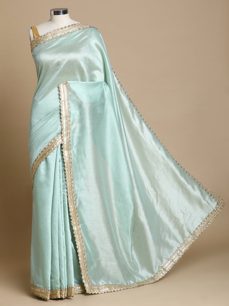 Anwesha x Tyohaar | Light Green Foil Chandheri Saree With Designer Embroidered Lace