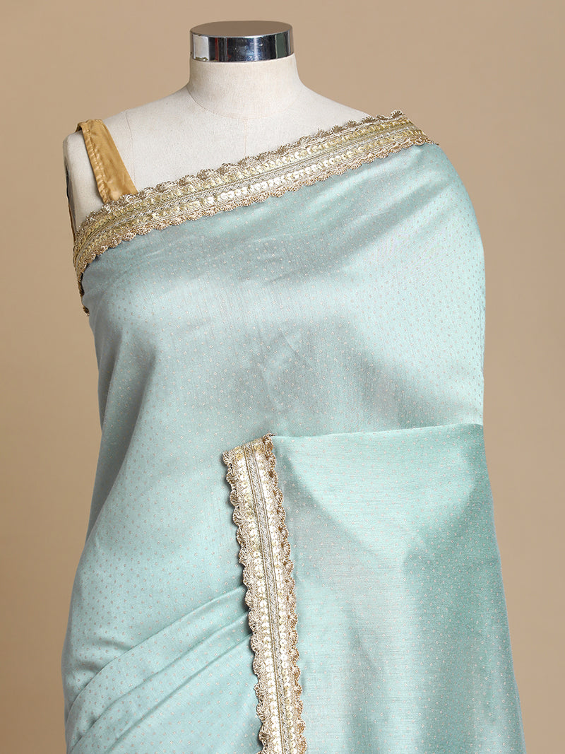 Anwesha x Tyohaar | Blue Green Foil Chandheri Saree With Designer Embroidered Lace