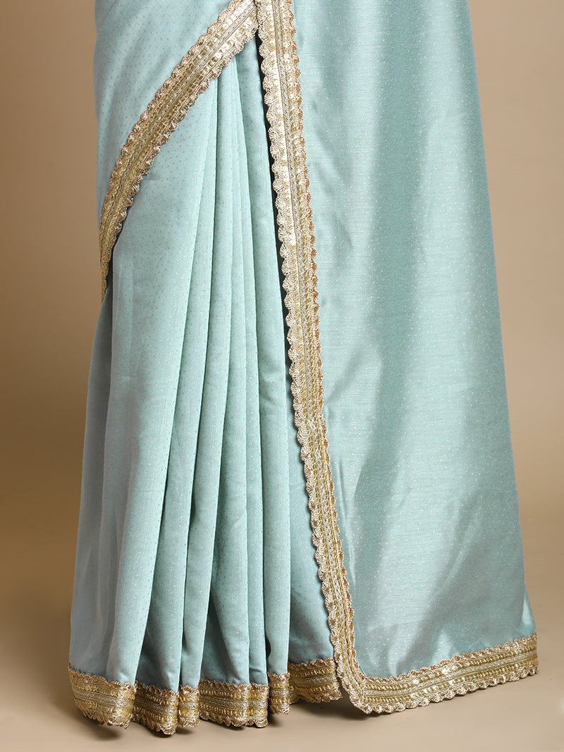 Anwesha x Tyohaar | Blue Green Foil Chandheri Saree With Designer Embroidered Lace