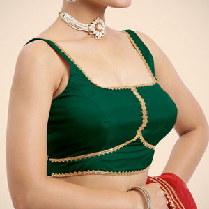 Arya x Tyohaar | Bottle Green Sleeveless FlexiFit™ Saree Blouse with Square Neck and Back Window Embeliished with Gota and Pearl Lace