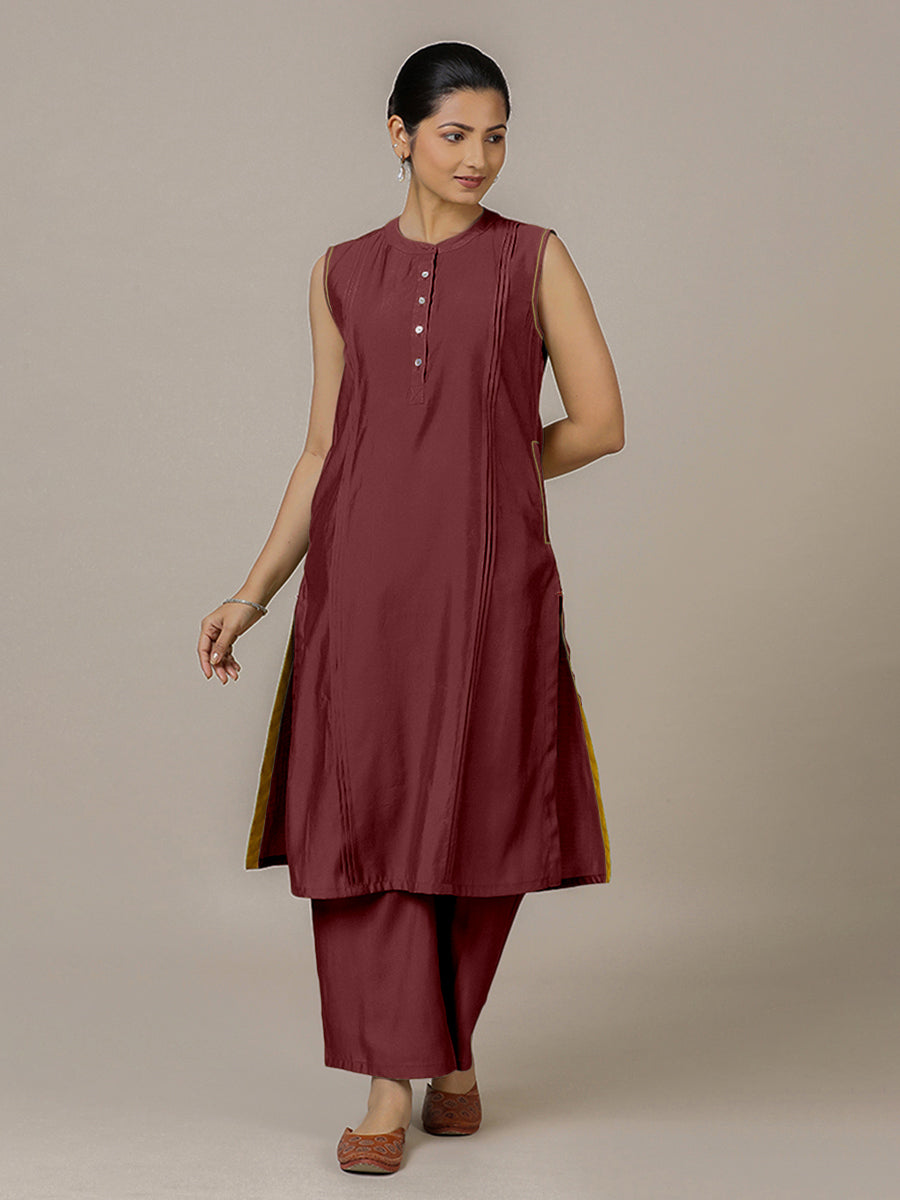 Alina x Rozaana Kurta, in Maroon Viscose, featuring sleeveless and flat collar neckline, made for daily & work.