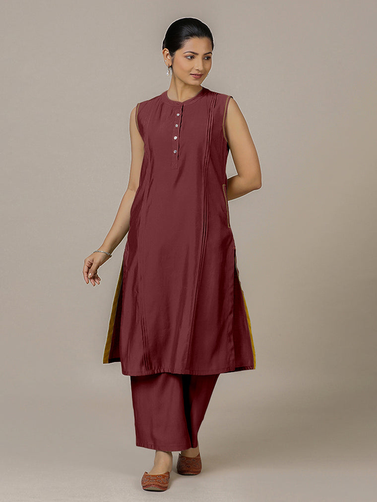 Alina x Rozaana Kurta, in Maroon Viscose, featuring sleeveless and flat collar neckline, made for daily & work.