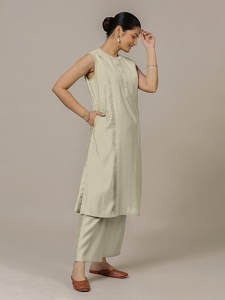 Alina x Rozaana Kurta, in Cream Viscose, featuring sleeveless and flat collar neckline, made for daily & work.