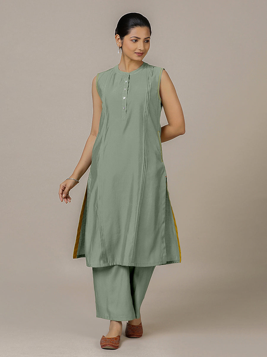 Alina x Rozaana Kurta, in Green Viscose, featuring sleeveless and flat collar neckline, made for daily & work.