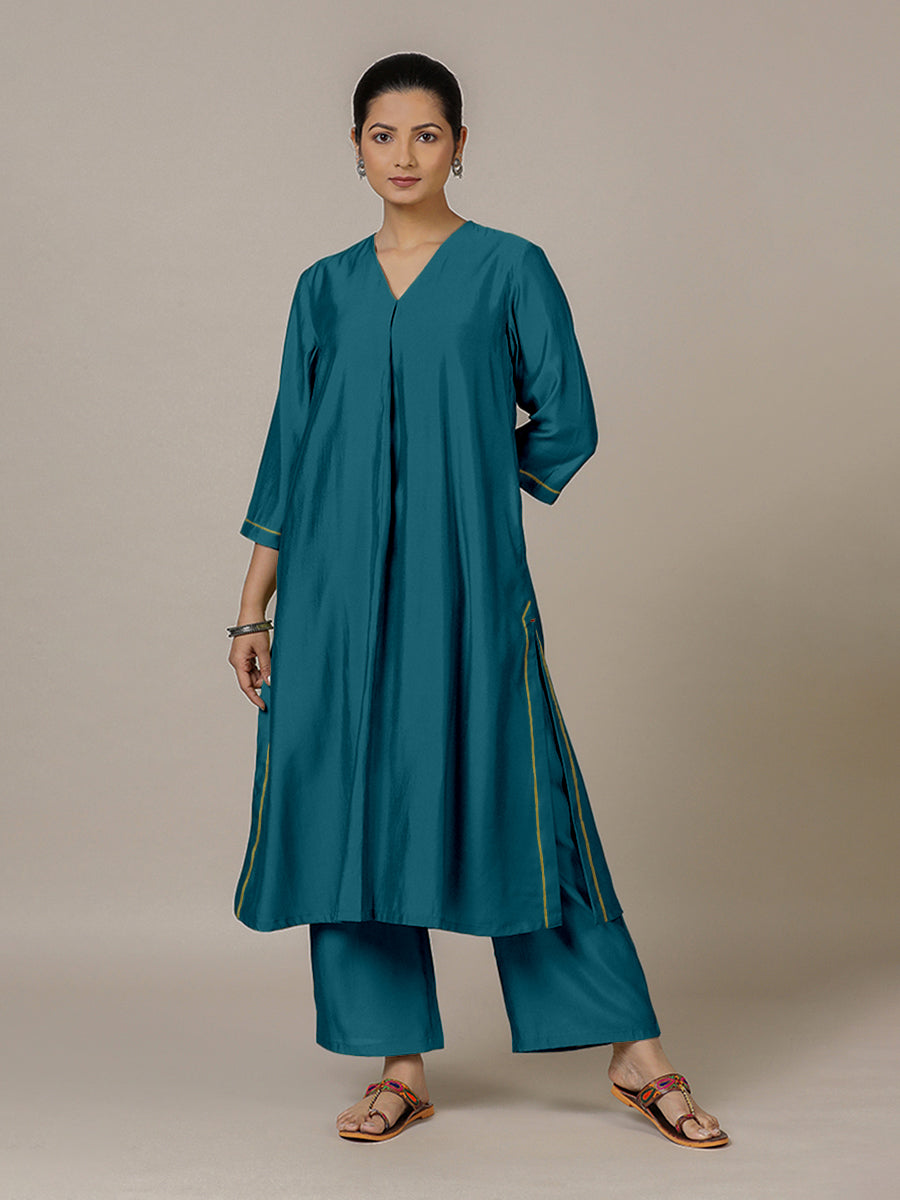 Alisha x Rozaana Kurta, in Blue Viscose, featuring three quarter sleeves and v-neckline, made for daily & work.