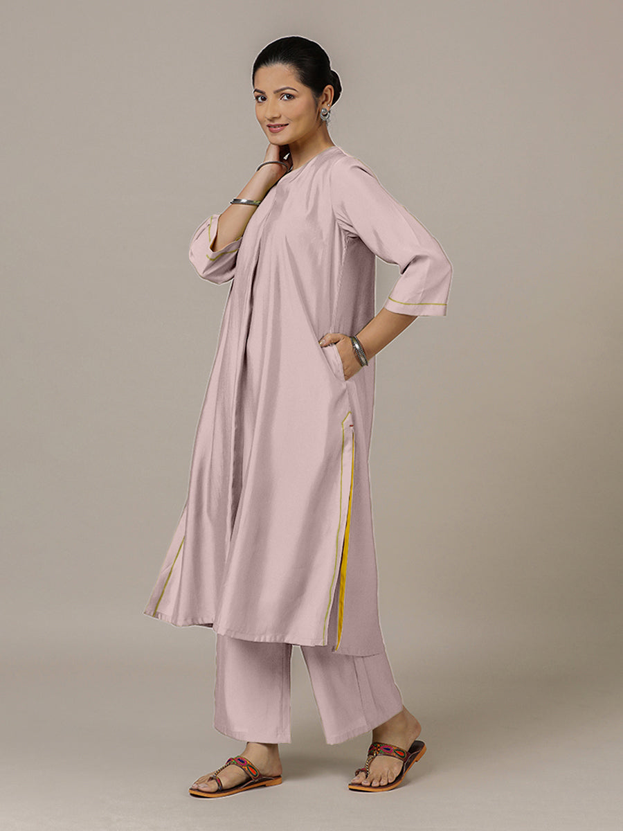Alisha x Rozaana Kurta, in Purple Viscose, featuring three quarter sleeves and v-neckline, made for daily & work.
