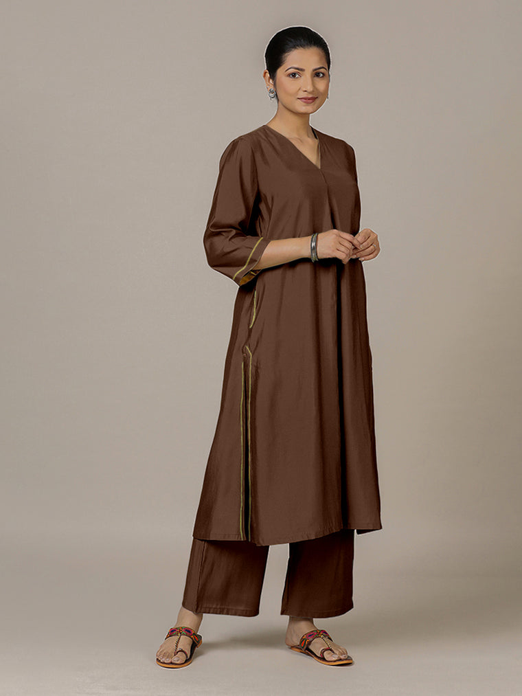 Alisha x Rozaana Kurta, in Brown Viscose, featuring three quarter sleeves and v-neckline, made for daily & work.