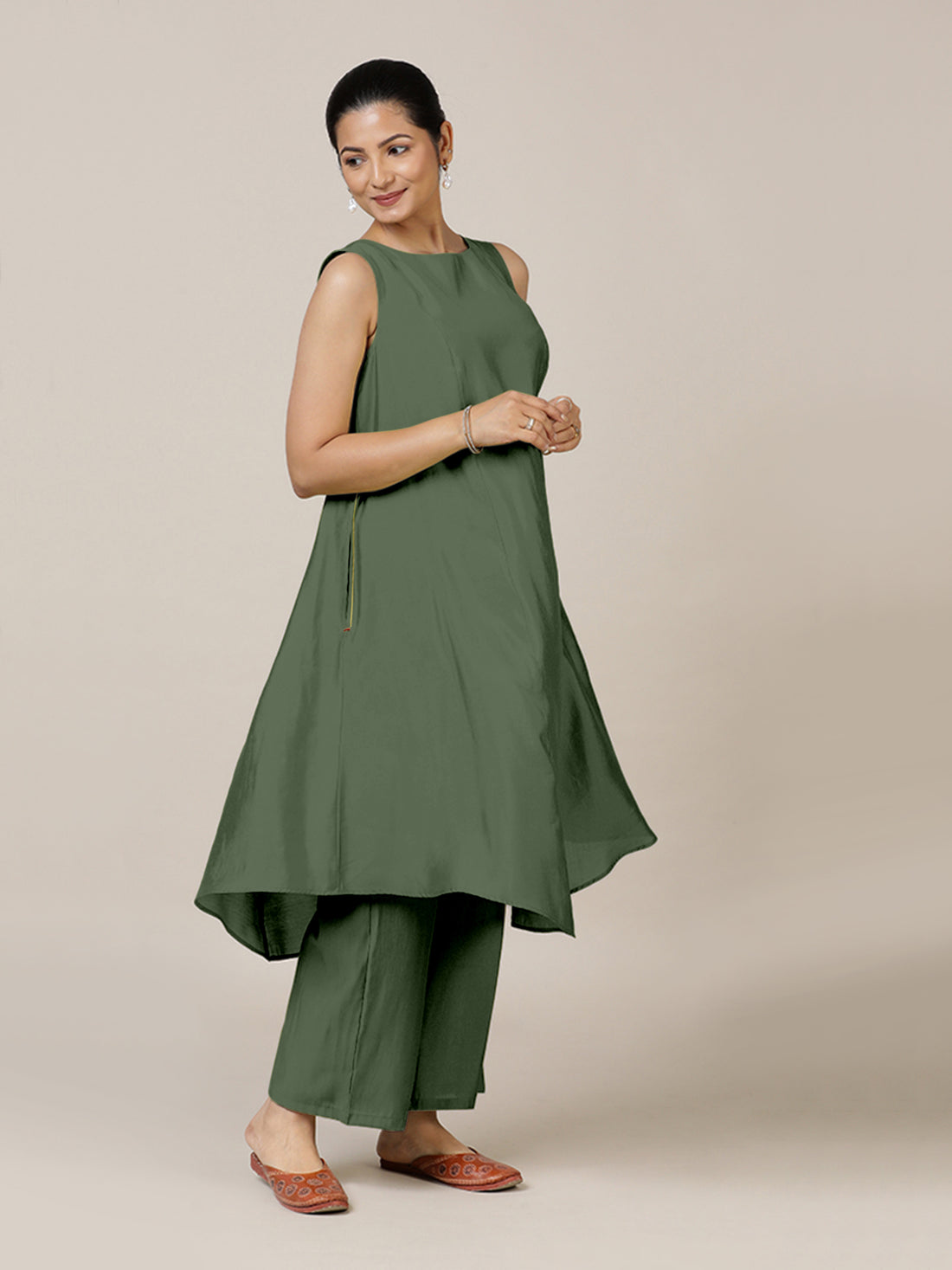 Anoki x Rozaana Kurta, in Green Viscose, featuring sleeveless and boat neckline, made for daily & work.