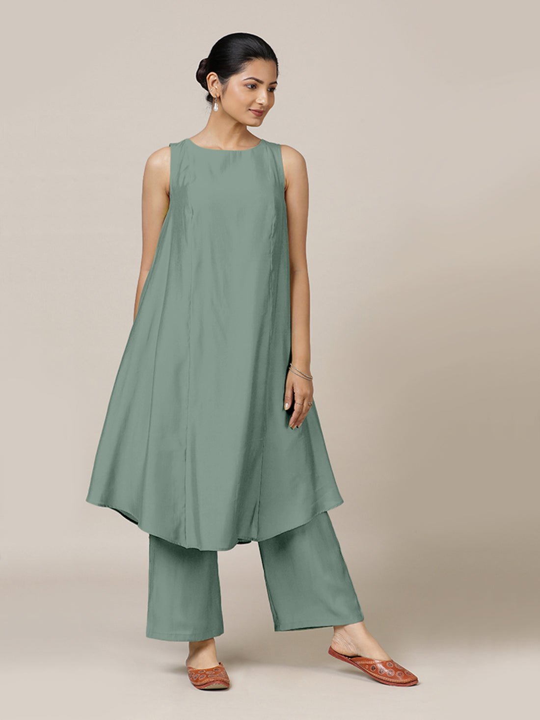 Anoki x Rozaana Kurta, in Green Viscose, featuring sleeveless and boat neckline, made for daily & work.