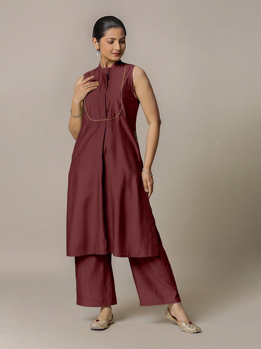 Eira x Rozaana Kurta, in Maroon Viscose, featuring sleeveless and band collar neckline, made for daily & work.