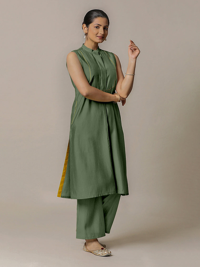 Eira x Rozaana Kurta, in Green Viscose, featuring sleeveless and band collar neckline, made for daily & work.
