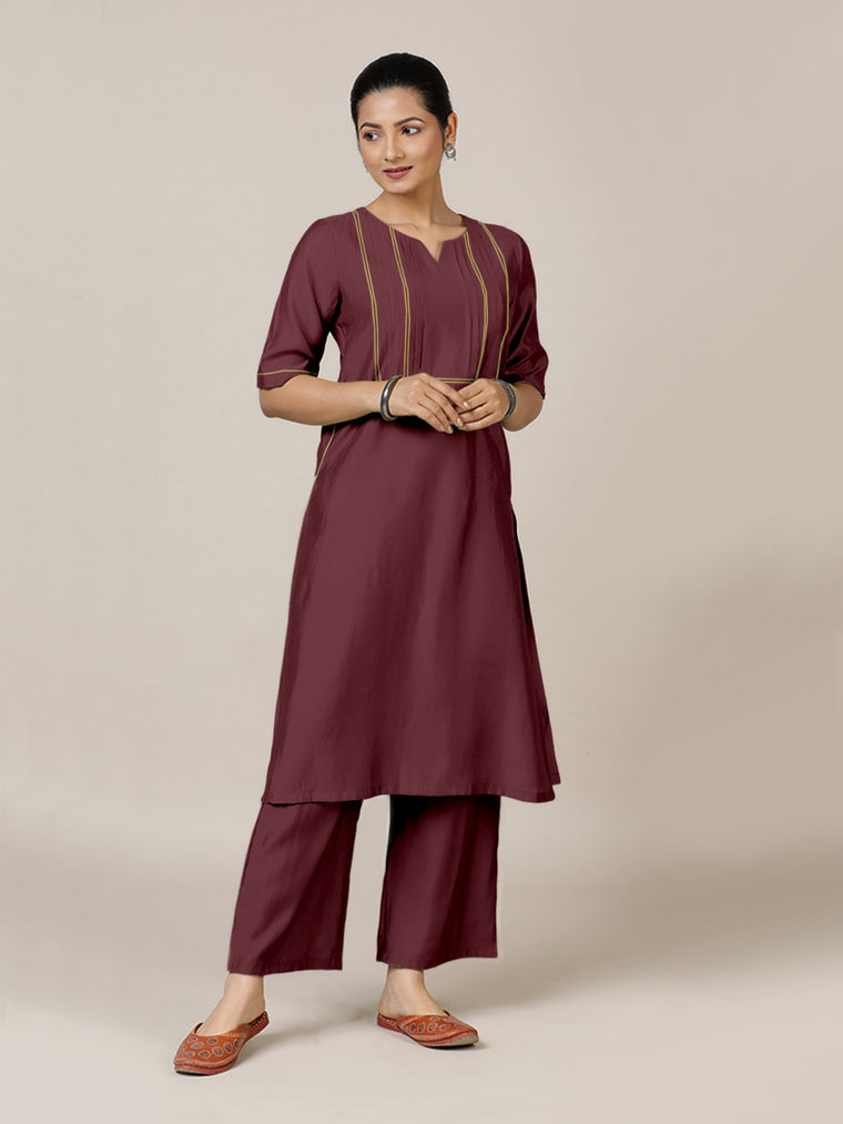 Esha x Rozaana Kurta, in Maroon Viscose, featuring elbow sleeves and round neck with splitline, made for daily & work.