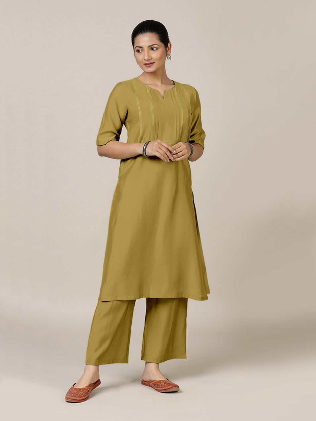 Esha x Rozaana Kurta, in Yellow Viscose, featuring elbow sleeves and round neck with splitline, made for daily & work (view 7).