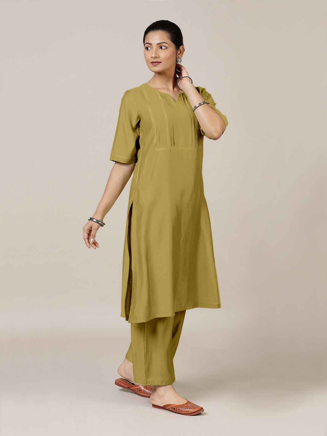 Esha x Rozaana Kurta, in Yellow Viscose, featuring elbow sleeves and round neck with splitline, made for daily & work (view 8).