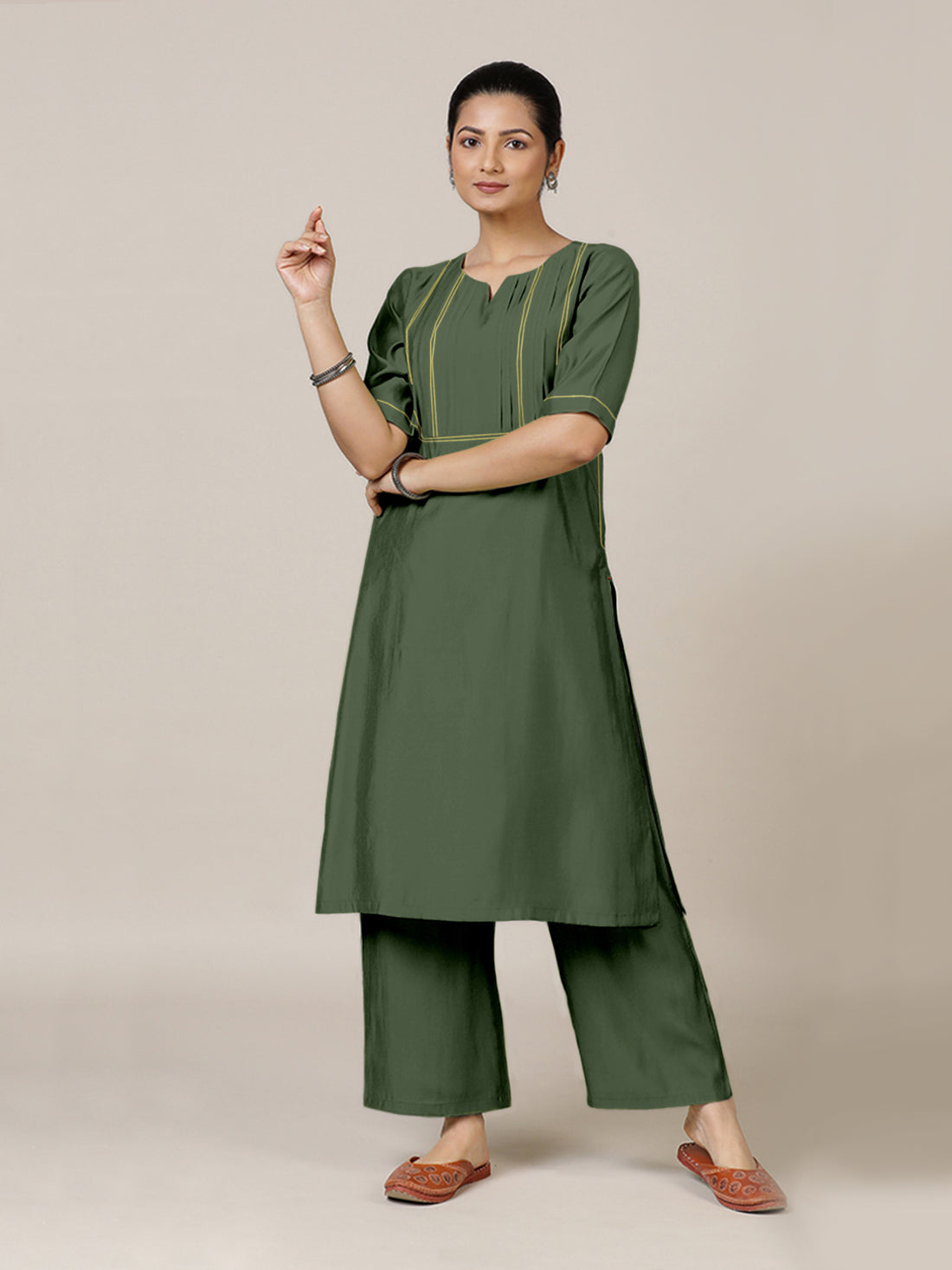 Esha x Rozaana Kurta, in Green Viscose, featuring elbow sleeves and round neck with splitline, made for daily & work (view 8).