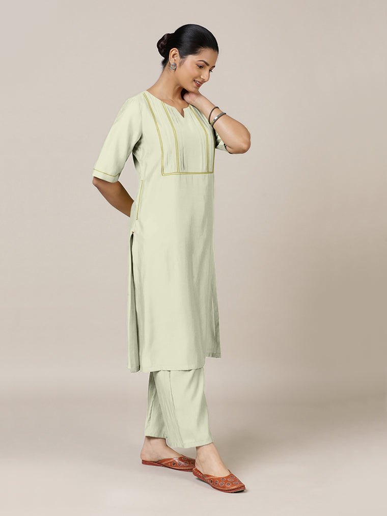 Esha x Rozaana Kurta, in Cream Viscose, featuring elbow sleeves and round neck with splitline, made for daily & work.