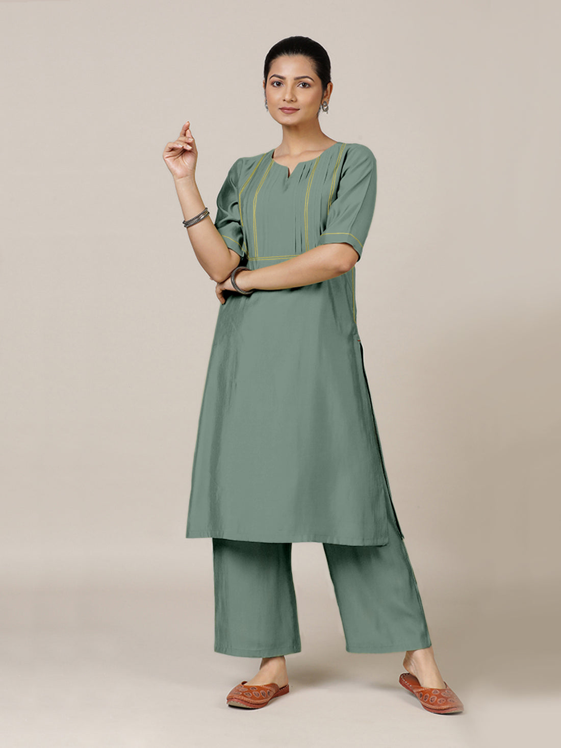 Esha x Rozaana Kurta, in Green Viscose, featuring elbow sleeves and round neck with splitline, made for daily & work (view 7).