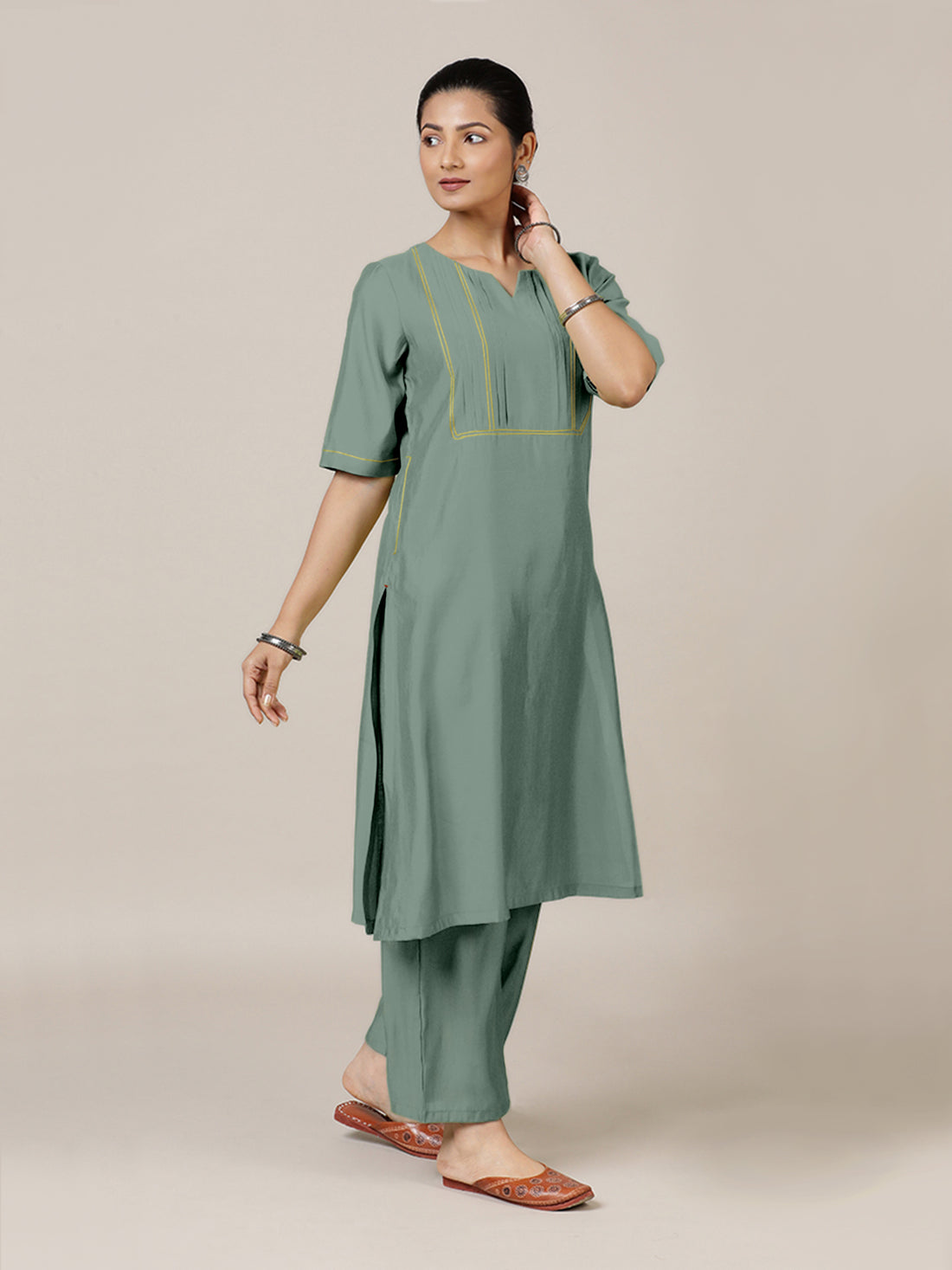 Esha x Rozaana Kurta, in Green Viscose, featuring elbow sleeves and round neck with splitline, made for daily & work (view 8).