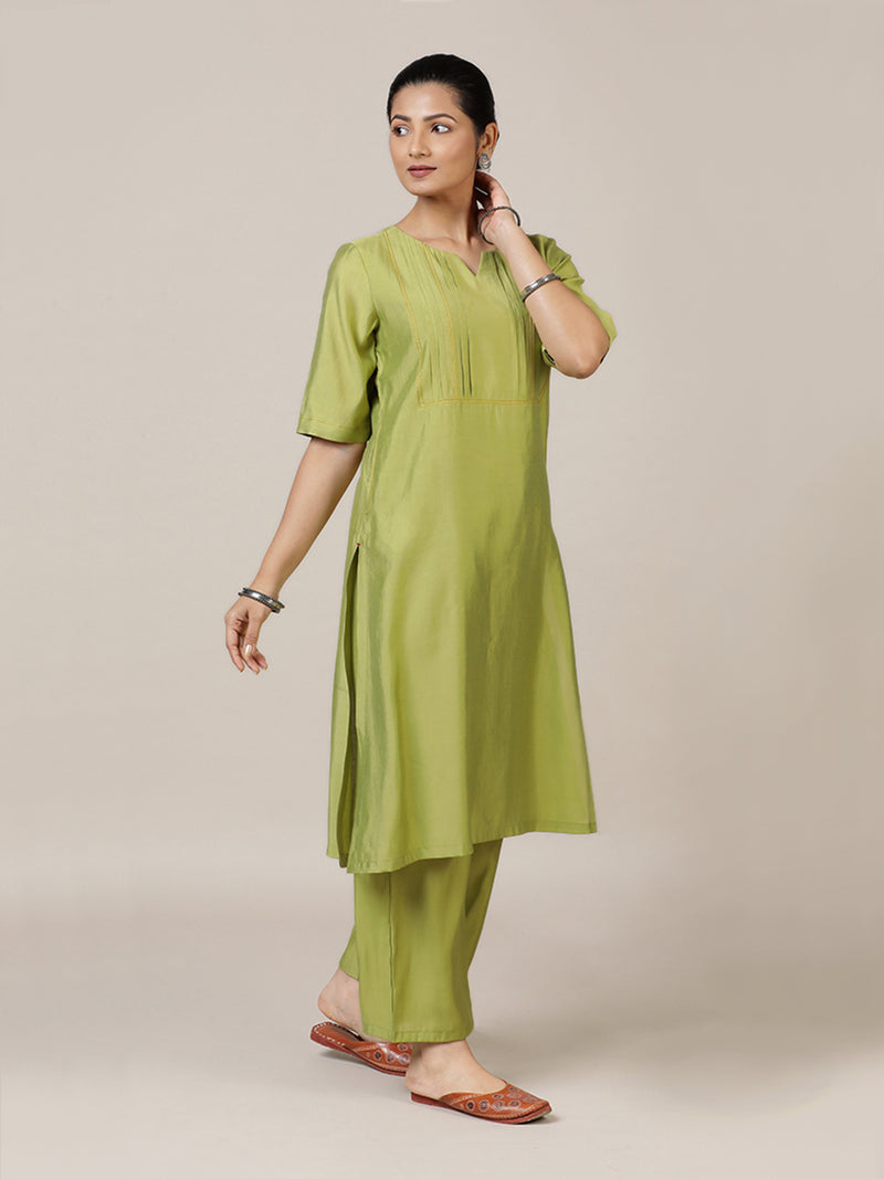Esha x Rozaana Kurta, in Green Viscose, featuring elbow sleeves and round neck with splitline, made for daily & work.