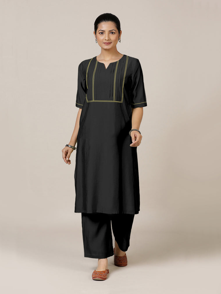 Esha x Rozaana Kurta, in Black Viscose, featuring elbow sleeves and round neck with splitline, made for daily & work.