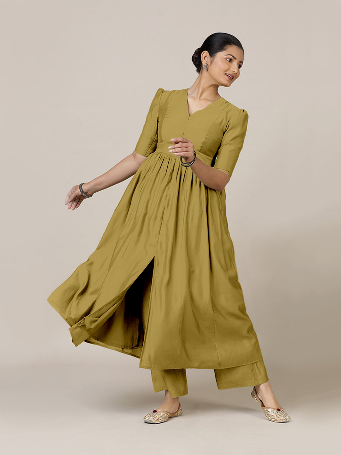 Faiza x Rozaana Kurta, in Yellow Viscose, featuring elbow sleeves and v-neckline, made for daily & work.