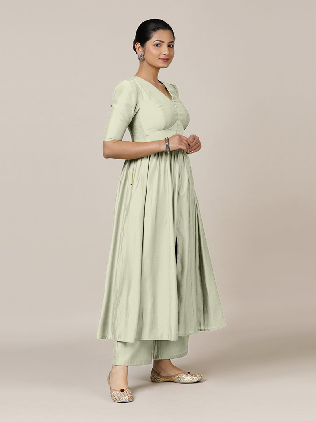 Faiza x Rozaana Kurta, in Cream Viscose, featuring elbow sleeves and v-neckline, made for daily & work.