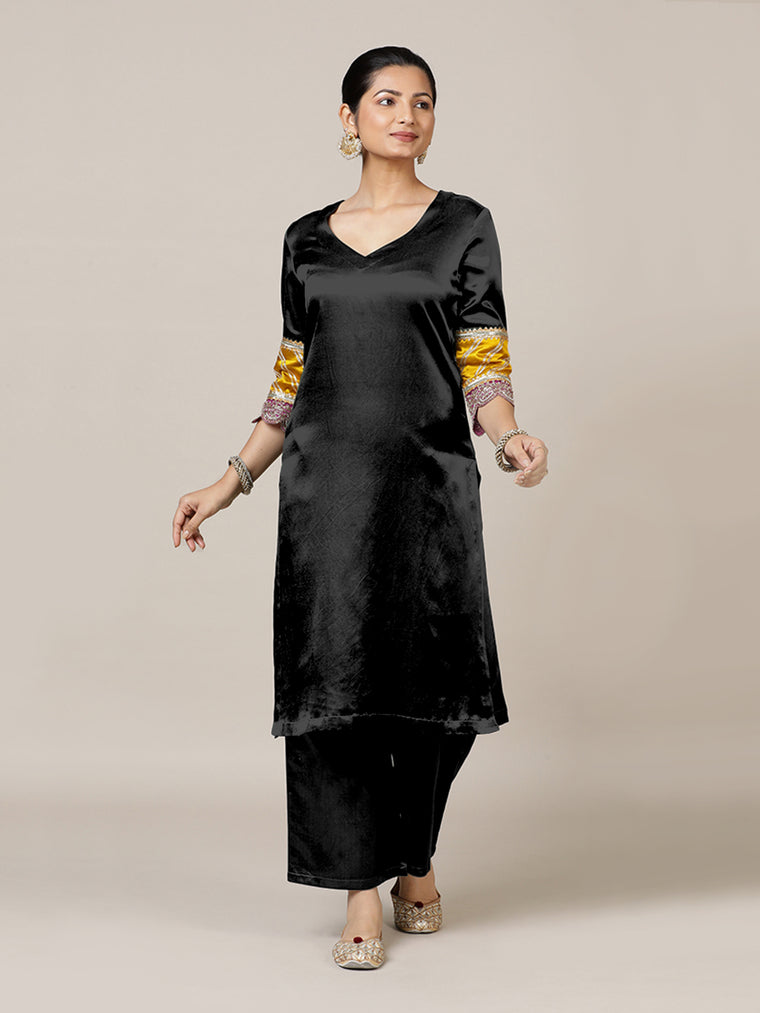 Kainaat x Tyohaar Kurta, in Black Vegan Silk, featuring three quarter sleeves and curved v-neckline.