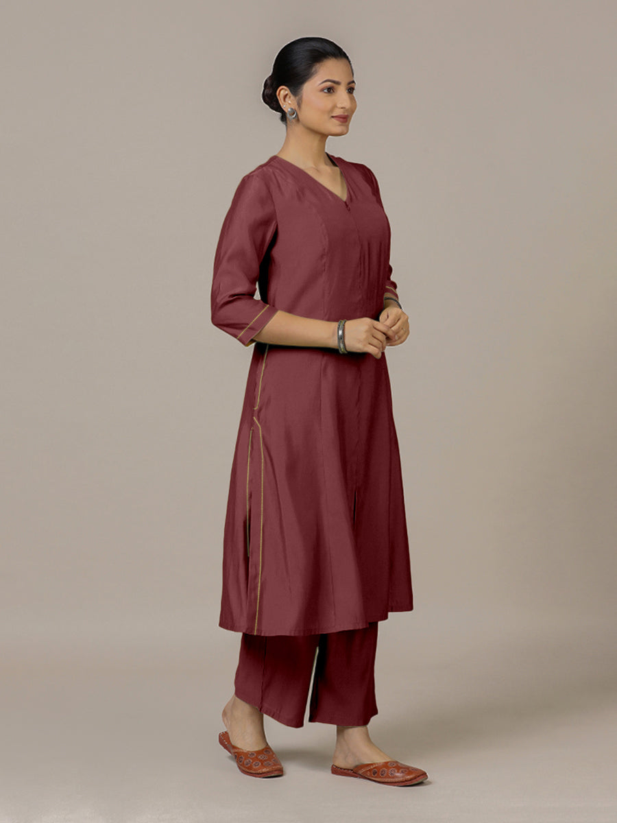 Mahek x Rozaana Kurta, in Maroon Viscose, featuring three quarter sleeves and v-neckline, made for daily & work.