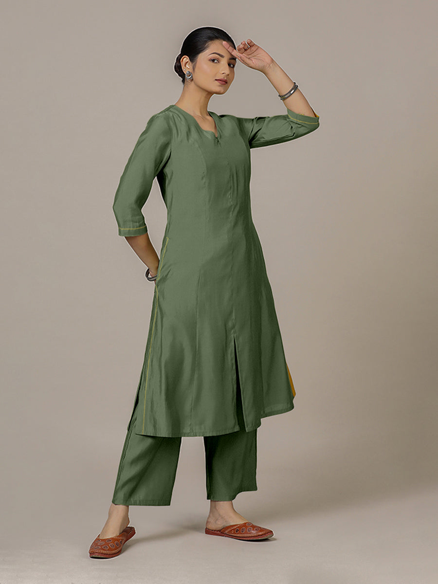 Mahek x Rozaana Kurta, in Green Viscose, featuring three quarter sleeves and v-neckline, made for daily & work.