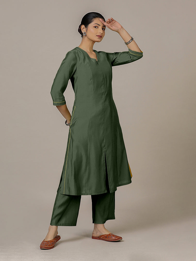 Mahek x Rozaana Kurta, in Green Viscose, featuring three quarter sleeves and v-neckline, made for daily & work.