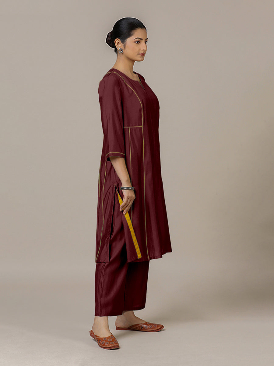 Mahi x Rozaana Kurta, in Maroon Viscose, featuring three quarter sleeves and round neck with splitline.