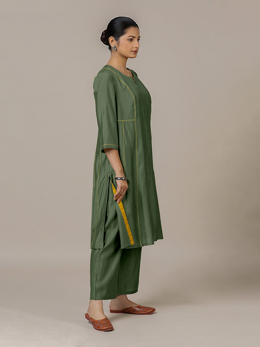 Mahi x Rozaana Kurta, in Green Viscose, featuring three quarter sleeves and round neck with splitline, made for daily & work.