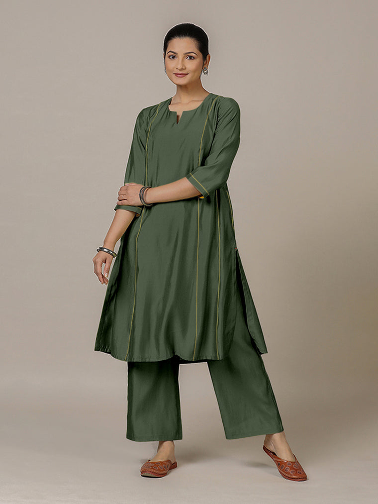 Mahi x Rozaana Kurta, in Green Viscose, featuring three quarter sleeves and round neck with splitline, made for daily & work.