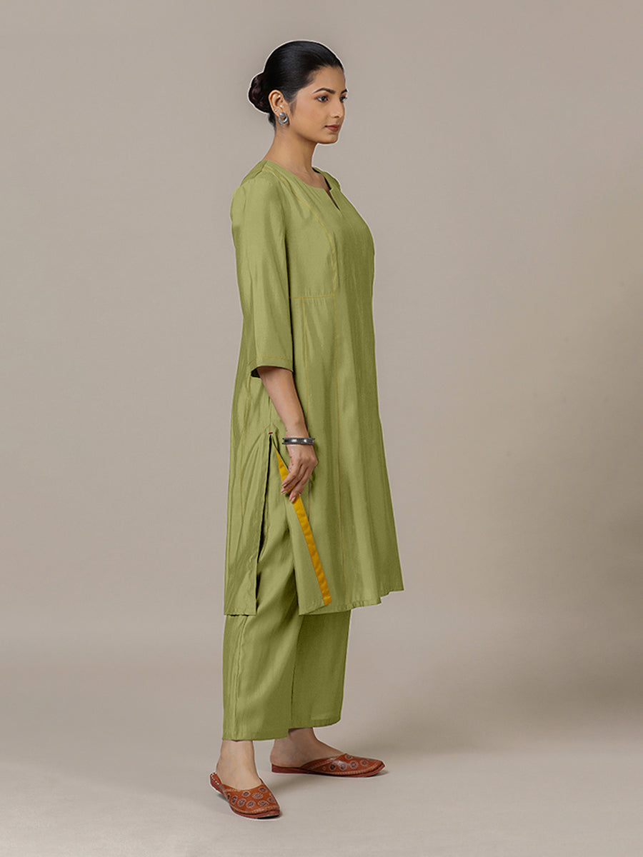 Mahi x Rozaana Kurta, in Green Viscose, featuring three quarter sleeves and round neck with splitline, made for daily & work.