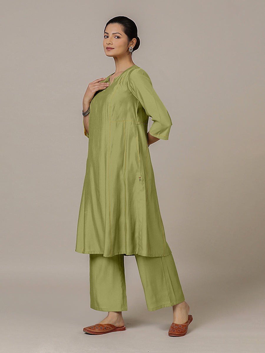 Mahi x Rozaana Kurta, in Green Viscose, featuring three quarter sleeves and round neck with splitline, made for daily & work.