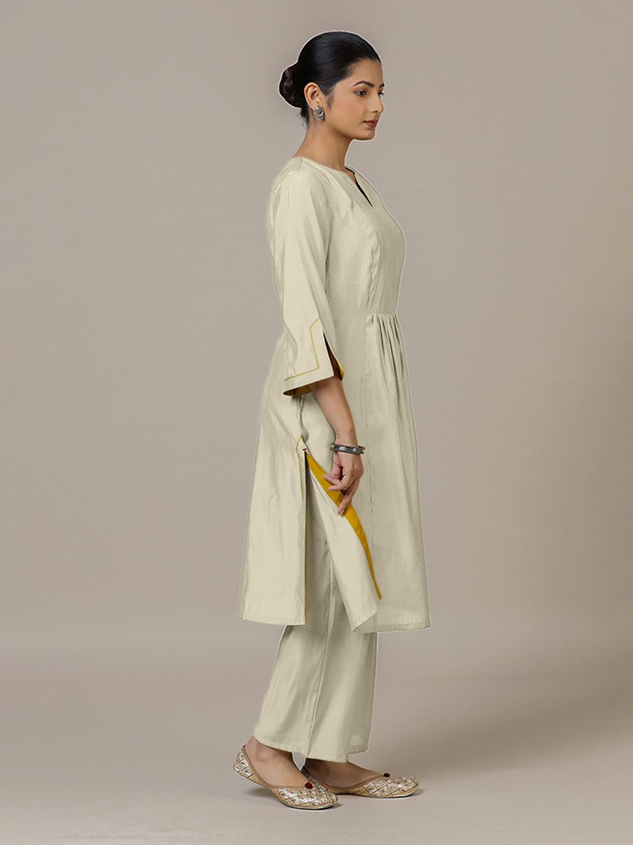 Nimrat x Rozaana Kurta, in Cream Viscose, featuring three quarter sleeves and round neck with splitline (view 5).