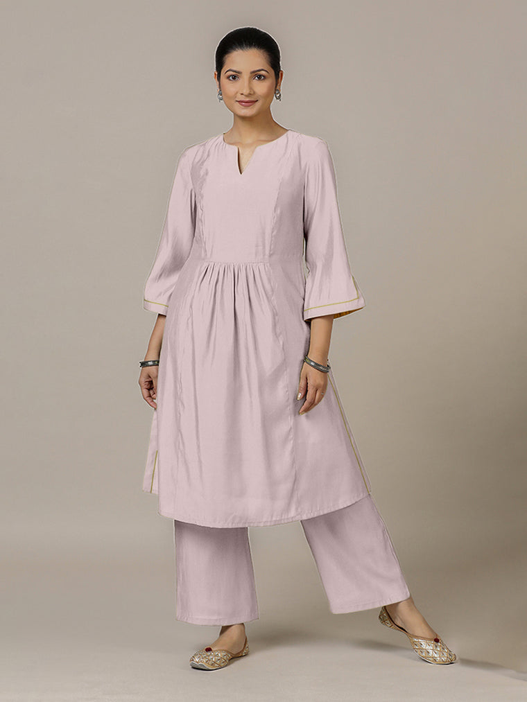 Nimrat x Rozaana Kurta, in Purple Viscose, featuring three quarter sleeves and round neck with splitline.