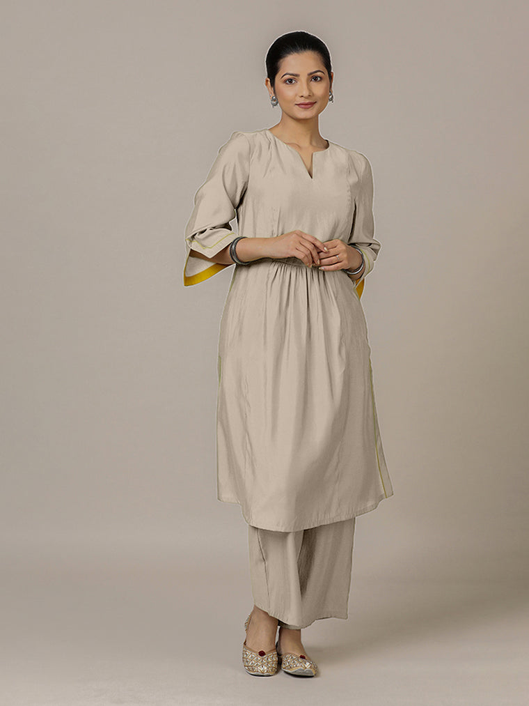 Nimrat x Rozaana Kurta, in Grey Viscose, featuring three quarter sleeves and round neck with splitline.