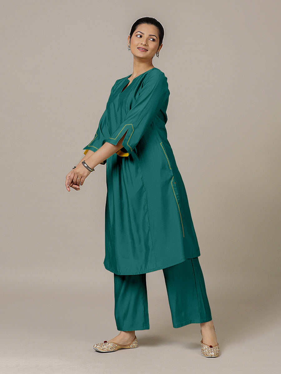 Nimrat x Rozaana Kurta, in Green Viscose, featuring three quarter sleeves and round neck with splitline.