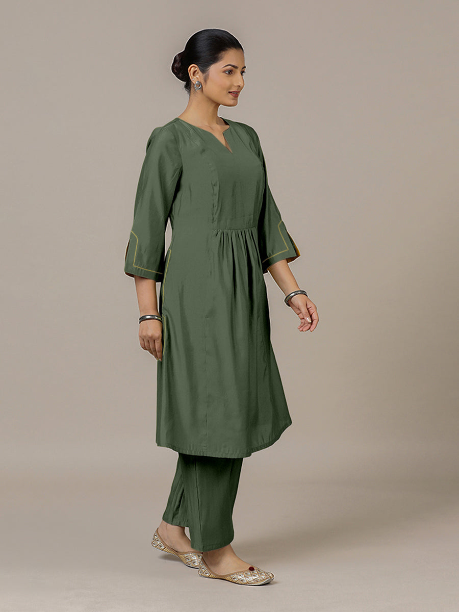 Nimrat x Rozaana Kurta, in Green Viscose, featuring three quarter sleeves and round neck with splitline.