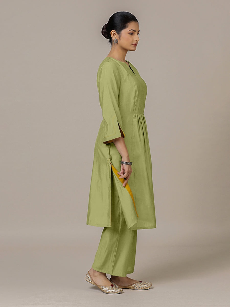 Nimrat x Rozaana Kurta, in Green Viscose, featuring three quarter sleeves and round neck with splitline (view 5).