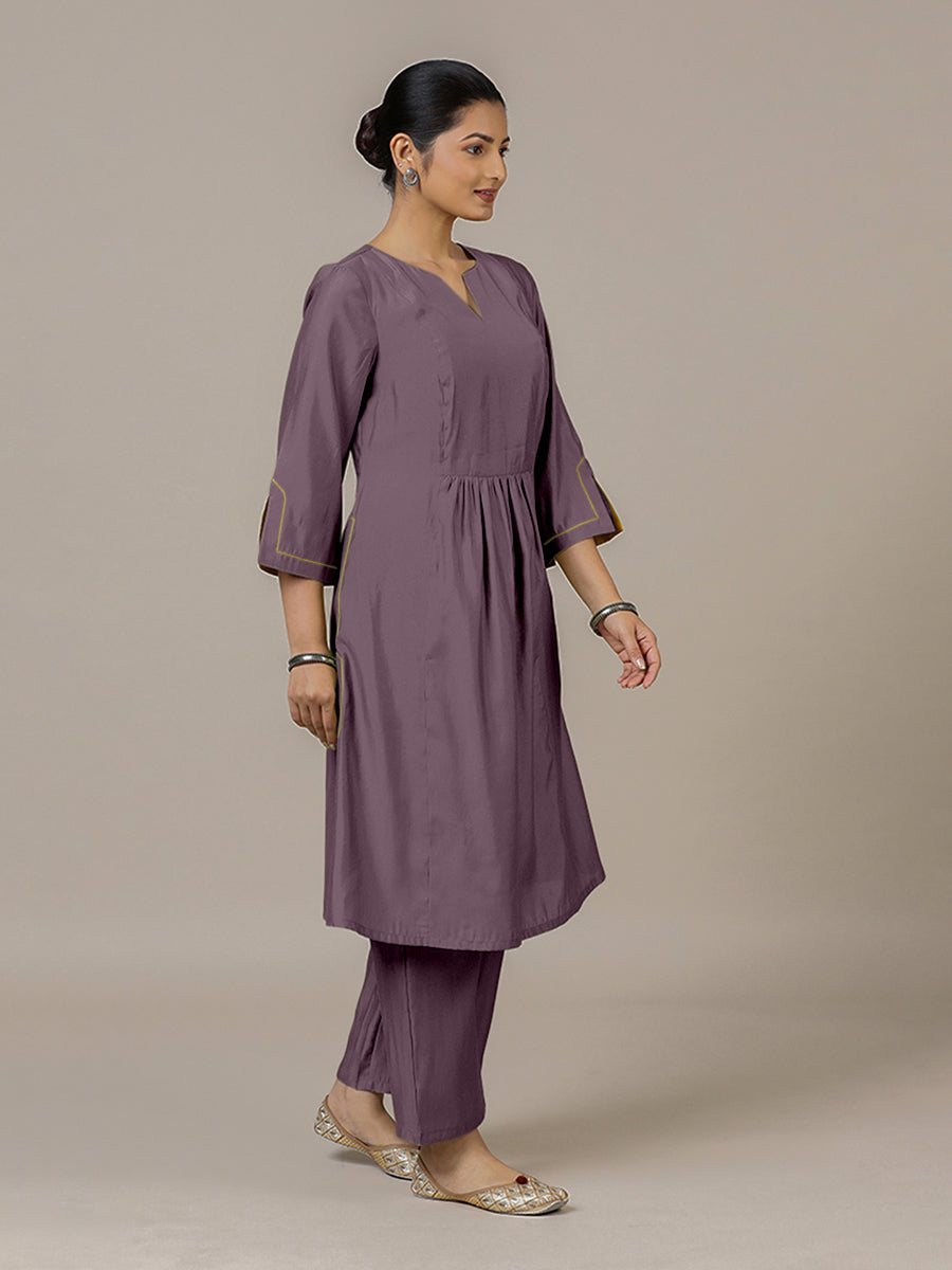 Nimrat x Rozaana Kurta, in Purple Viscose, featuring three quarter sleeves and round neck with splitline.