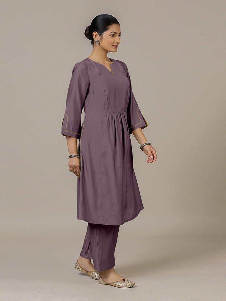 Nimrat x Rozaana Kurta, in Purple Viscose, featuring three quarter sleeves and round neck with splitline.