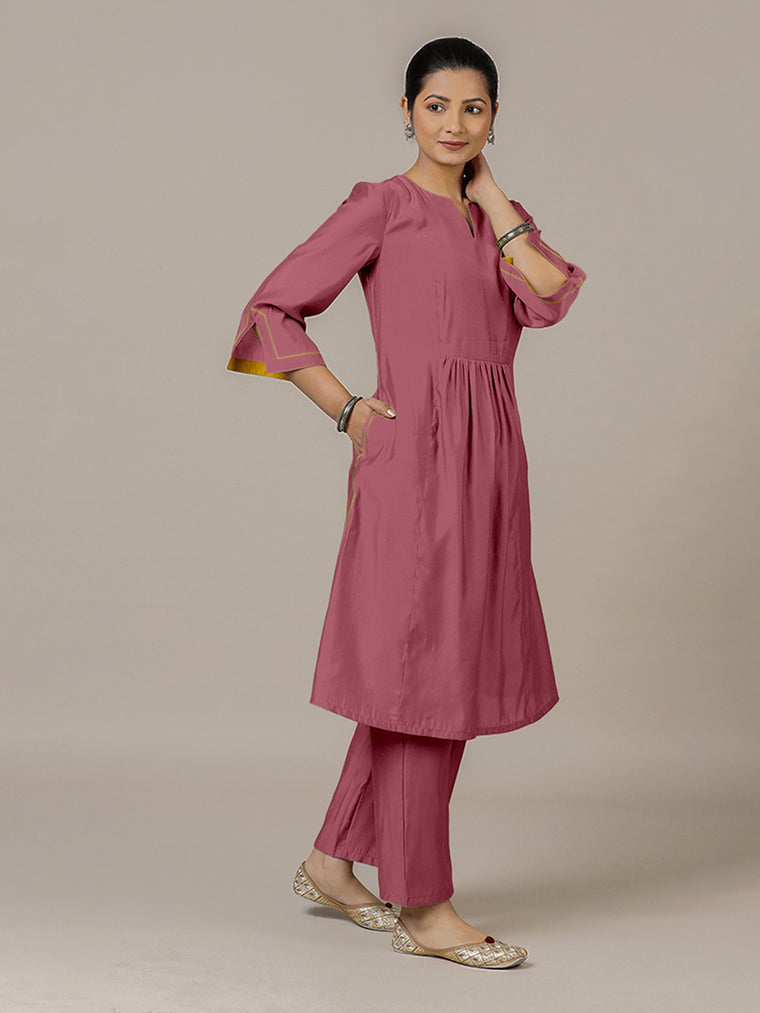 Nimrat x Rozaana Kurta, in Pink Viscose, featuring three quarter sleeves and round neck with splitline.